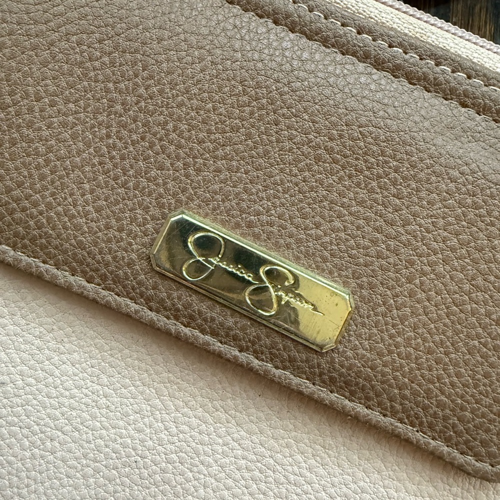 Jessica Simpson Pink, Beige and Tan Wallet Purse with Gold Logo.